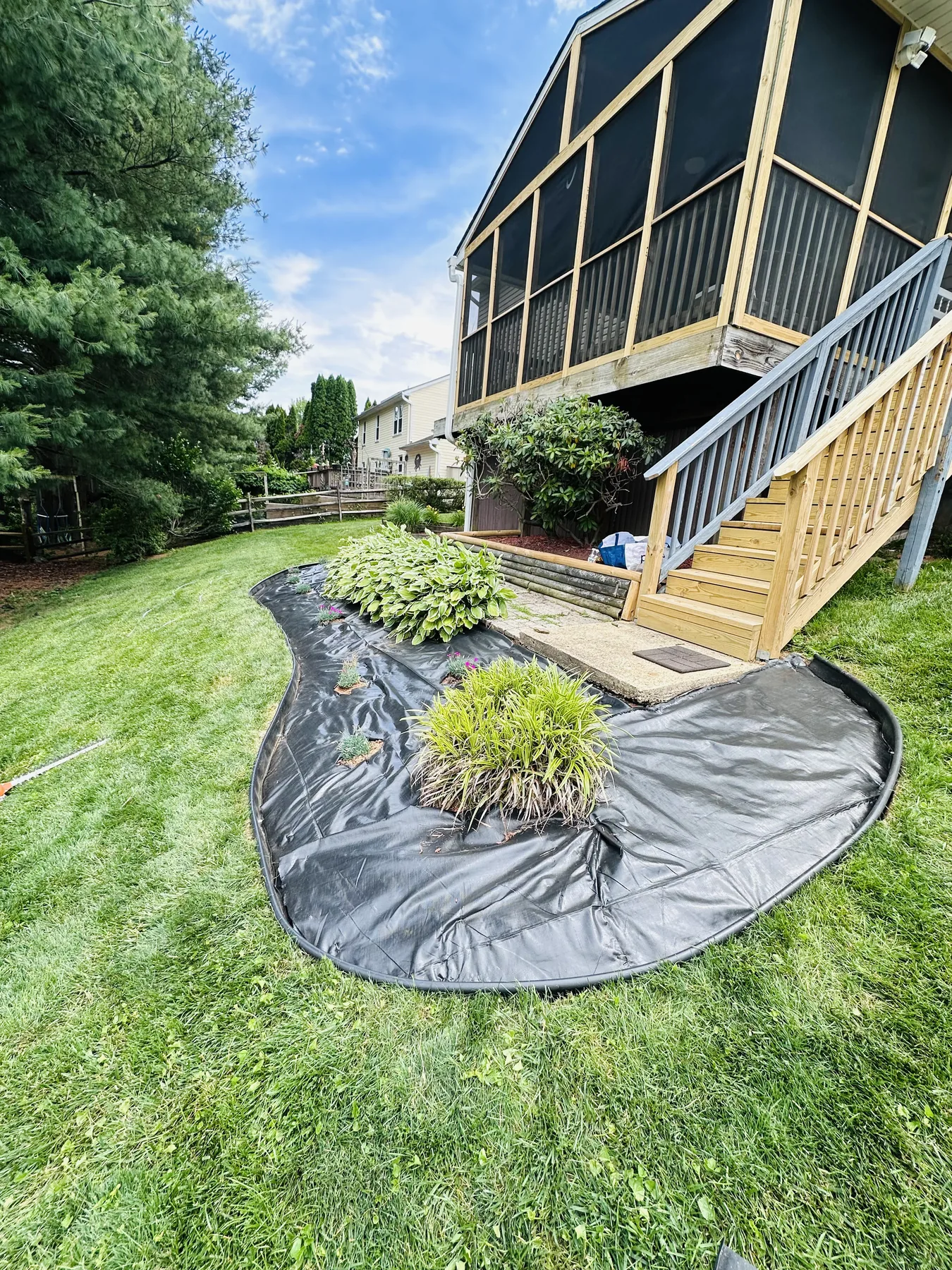 Before: backyard bed in Bel Air, MD with weed fabric laid and bare soil